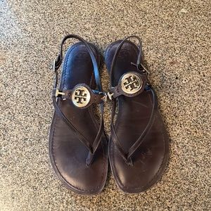leather tori burch sandals , cushion sole, straps and buckles in good condition